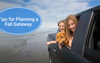 Girls and a dog looking out a truck window. text: Five Tips for Planning a Fall Getaway